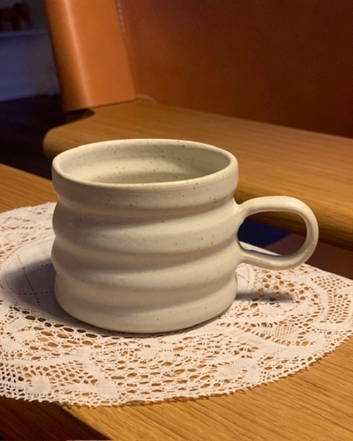 ORLE STUDIO RILLE KOP MED HANK LILLE LYS MAT